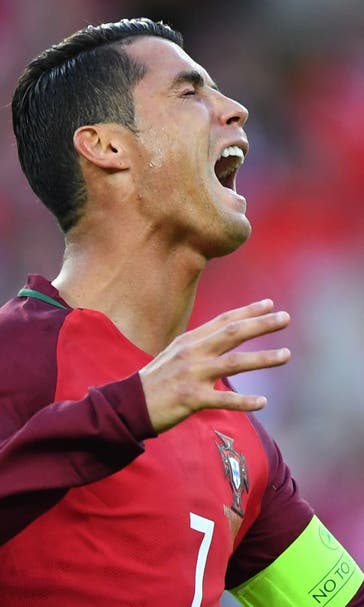 Angry Ronaldo throws reporter's microphone into lake